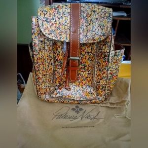 Very cute Patricia Nash backpack bag with storage bag.